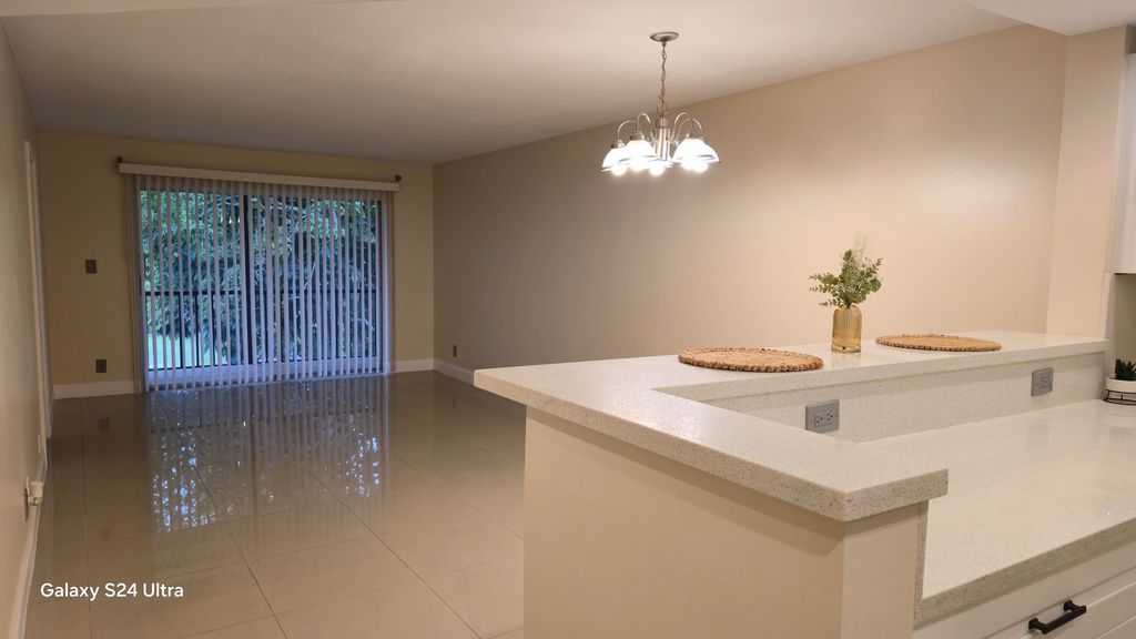 Photo of 8000 S Colony Cir Circle #309, Tamarac, FL 33321 (MLS # B26020670)