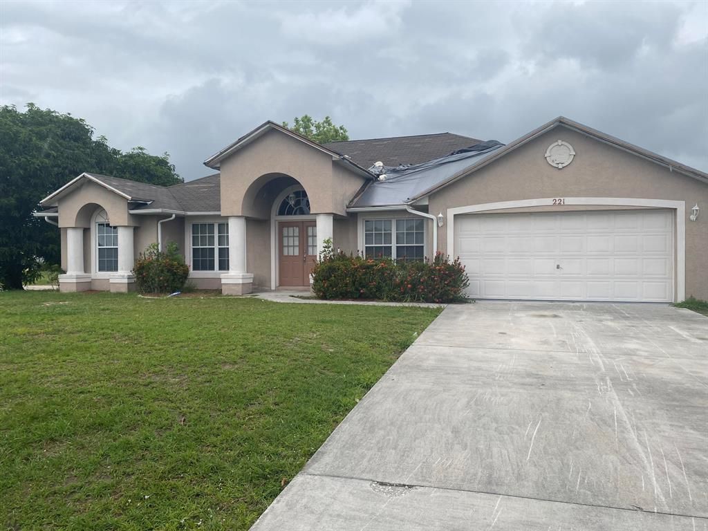 Photo of 221 SW Amesbury Avenue, Port St Lucie, FL 34953 (MLS # R10887723)