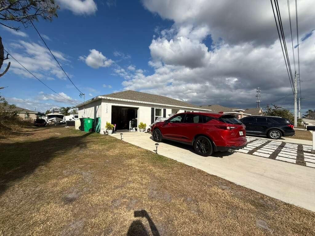 Photo of 133 SW Becker Rd, Port Saint Lucie, FL 34953 (MLS # R11156646)