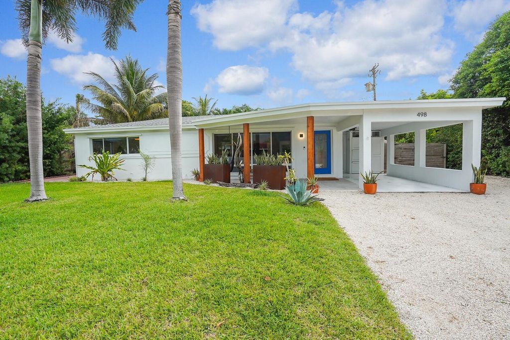 Photo of 498 NE 5th Circle, Boca Raton, FL 33431 (MLS # F10515547)