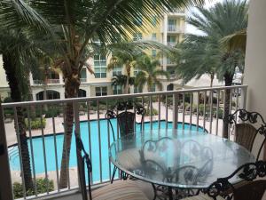 Spectacular 2/2 fully furnished waterfront unit in the Moorings at lantana... This well played out unit features a spacious split bedroom floor plan with private guest quarters, large living room with views of the Pool, Marina, and Intracoastal, Large open kitchen with Granite countertops, high end appliances and so much more... this unit is being offered Fully Furnished and Turn Key so all you need is your toothbrush and clothes! Rent includes water, basic cable, trash, sewer, and Valet service...