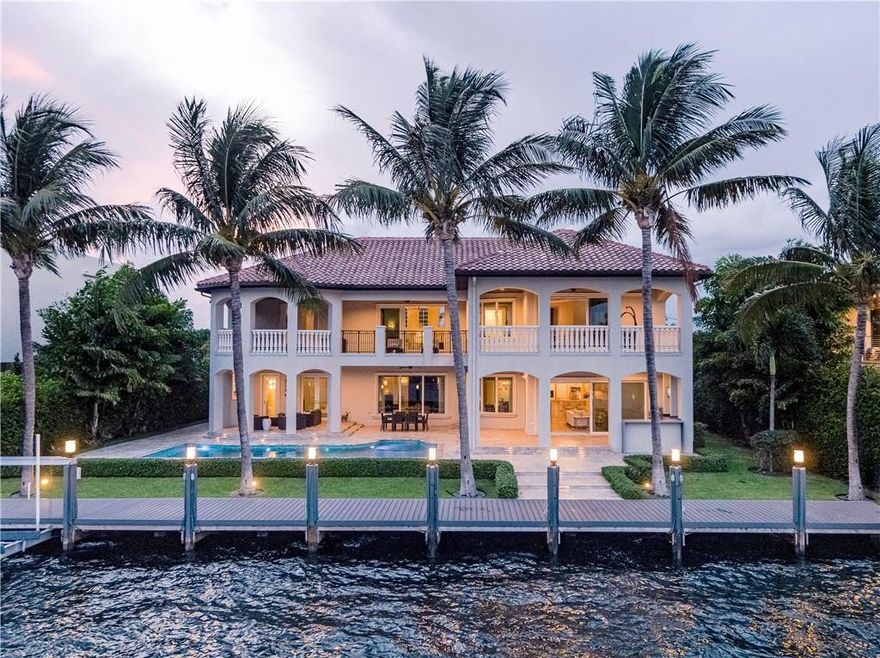 Make your home in South Florida & along the Intracoastal Waterway. A  lifestyle to be  unmatched anywhere in the world.You deserve a home that equals & even exceeds those desires.Front to back top to bottom,this exclusively private, gated residence will capture your imagination, and tell a story you’re eager to be a part of.The sophisticatedly modern interiors,w/ exquisite materials & finishing’s, boast a ground-floor owner’s suite w/ direct patio & pool access.Gourmets will appreciate the designer center island kitchen w/walk-in pantry,& entertainment is enhanced by the walk-in wine room & formal dining room. Amenities are endless. On the 2nd level find 3 additional bedrooms,half-bath, a second-floor balcony, 2 full laundry rooms, 3 gas fireplaces, and 4-car garage w/ room for lifts. From the elegantly gated drive, through the French front doors and formal foyer, to the 2200 square feet of outdoor living and entertainment space, highlighted by the heated saltwater pool, and 100 feet of Intracoastal dockage with boat and jet ski lifts, this exceptional residence leaves truly nothing to be desired for the luxury homebuyer. Within the home, 5600 square feet encompass an expansive first-floor owner’s suite with large master bath and seating area, as well as direct patio and pool access. On the second level, find three additional bedrooms along with a secondary living room and terrace balcony. Best-in-class amenities include an oversized walk-in pantry in the gourmet island kitchen, first- and second-floor laundry rooms, and an enviable walk-in wine room. Garages currently accommodate 4 cars and can be modified with lifts. An outdoor kitchen, 3 gas fireplaces, and security system are among the copious upgrades.You can choose to live anywhere, but you make your home in South Florida and along the Intracoastal Waterway because of the lifestyle, unmatched anywhere in the world. You deserve a home that equals and even exceeds those desires. Front to back, top to bottom, this exclusively available private, gated residence will capture your imagination, and tell a story you’re eager to be a part of. The sophisticatedly modern interiors, with exquisite materials and finishing’s, boast a ground-floor owner’s suite with direct patio and pool access. Gourmets will appreciate the designer center island kitchen with oversized walk-in pantry, and entertainment is enhanced by the walk-in wine room and formal dining room. Amenities are endless. Across over 5600 square feet within, 2200 square feet of exterior living, and two levels, find 3 additional bedrooms, half-bath, a second-floor balcony, 2 full laundry rooms, 3 gas fireplaces, and 4-car garage with room for lifts. Sprawling outdoor seating, entertainment, and kitchen spaces overlook the saltwater pool, and 100 feet of Intracoastal frontage with boat and Jet Ski lifts.