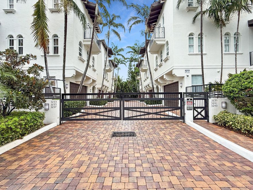 Discover coastal luxury in this truly one of a kind home located in an exclusive six residence gated community with 24 hr video surveillance. Ideally situated one block from the beach and the intercostal. Boasting 4 bedrooms, 3.5 bathrooms, first floor bedroom with an en-suite .Home features a bright open concept living space that seamlessly connects the kitchen, dining and living areas. Kitchen offers double ovens and ice maker. Additional features include Impact Windows and Doors,  two car garage, an in unit elevator that provides effortless access to all levels. Enjoy relaxing in your private pool and patio area. Whether you're seeking a primary residence or a vacation retreat this rare offering combines location, luxury and lifestyle in one unforgettable package​​‌​​​​‌​‌​​​‌‌​​​‌‌‌​​‌​​‌‌​​​​ .