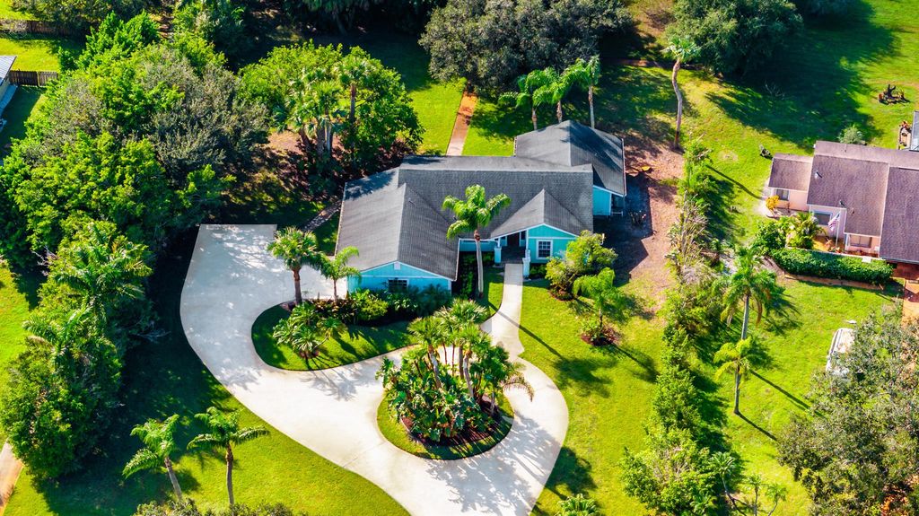 Photo of 2232 SW Racquet Club Drive, Palm City, FL 34990 (MLS # R11030442)