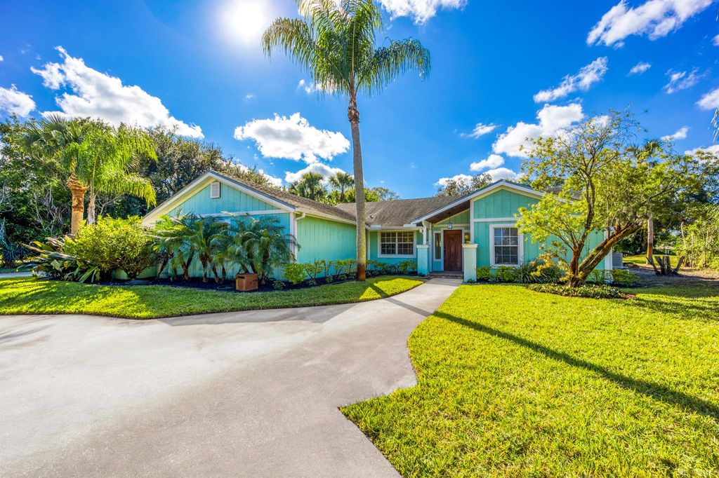 Photo of 2232 SW Racquet Club Drive, Palm City, FL 34990 (MLS # R11030442)