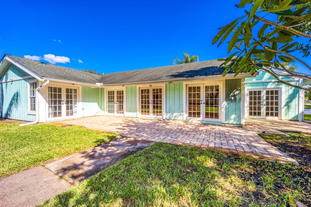 Photo of 2232 SW Racquet Club Drive, Palm City, FL 34990 (MLS # R11030442)