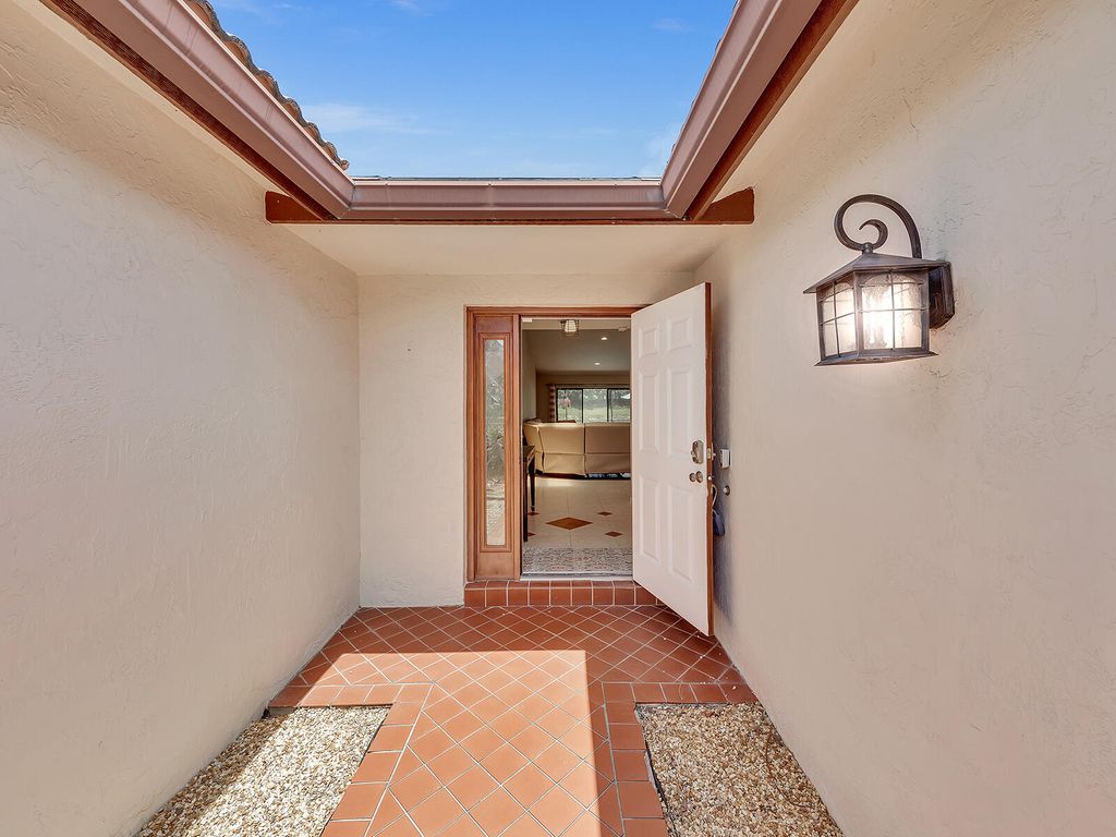 Photo of 7747 Villa Nova Drive, Boca Raton, FL 33433 (MLS # B26026666)