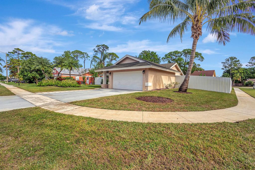 Photo of 145 Parkwood Drive, Royal Palm Beach, FL 33411 (MLS # R10948516)