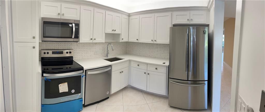 Photo of 2801 N Palm Aire Dr #107, Pompano Beach, FL 33069 (MLS # F10261531)