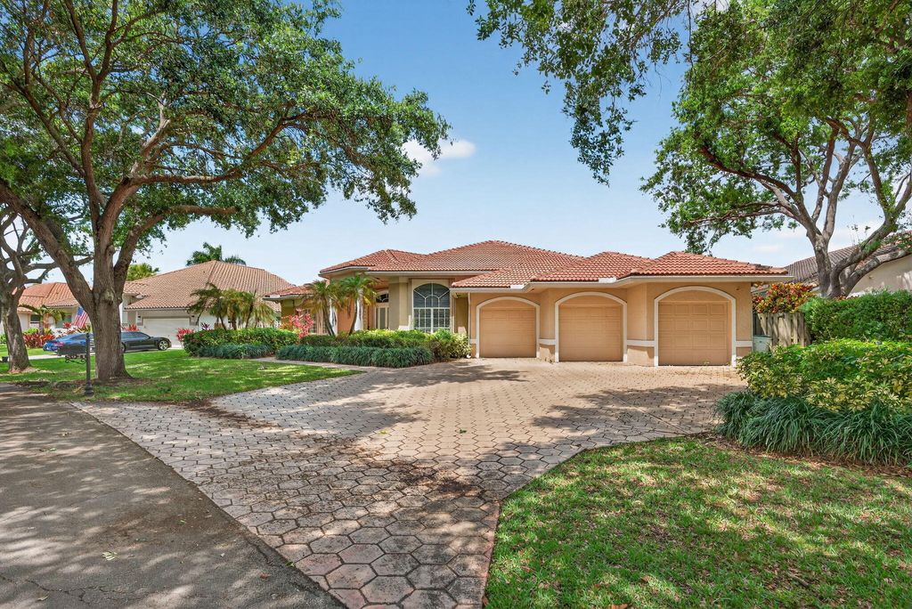 Photo of 5921 NW 61st Manor, Parkland, FL 33067 (MLS # B26009710)