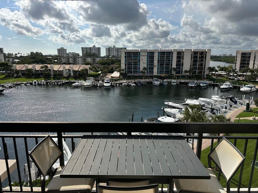 UPDATED 2BR/2BA CONDO STEPS FROM THE OCEAN at the exclusive resort-like Yacht & Racquet Club of Boca Raton. The main area of this contemporary unit has travertine marble flooring that matches the brown kitchen cabinets, quartz countertops & stainless-steel appliances. Enjoy sunsets from your own balcony or head to the private beach. YARCOBR has 750' of private beach, deepwater marina w/available dockage. Luxury living at it's finest, w/full-service restaurant Chickee Bar overlooking the Private Marina, 3 pools and 2 jacuzzies, 4 Tennis & 12 Pickleball Courts, Clubhouse, Fitness Center, Activities & Private Deeded Beach Access w/chairs. Come make this Your New Home in Paradise!