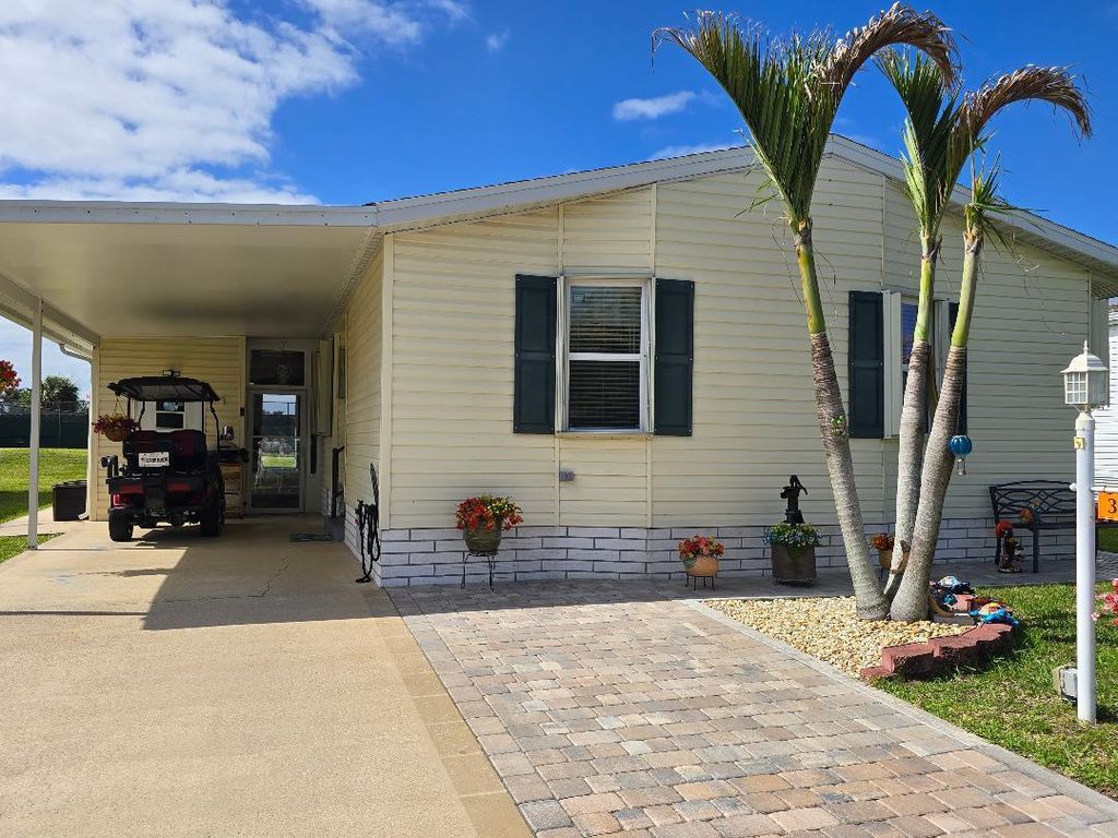 Photo of 337 Seahorse Terrace, Fort Pierce, FL 34982 (MLS # B26016381)