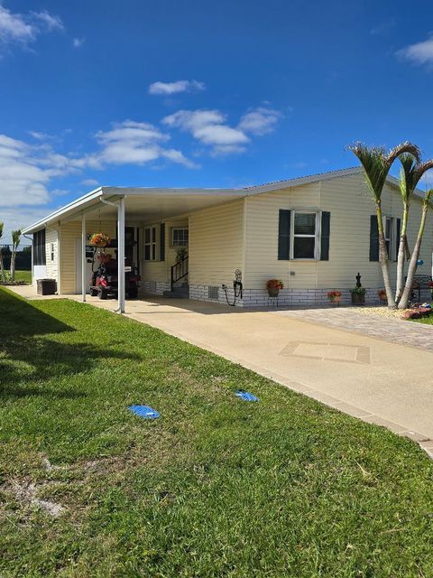 Photo of 337 Seahorse Terrace, Fort Pierce, FL 34982 (MLS # B26016381)