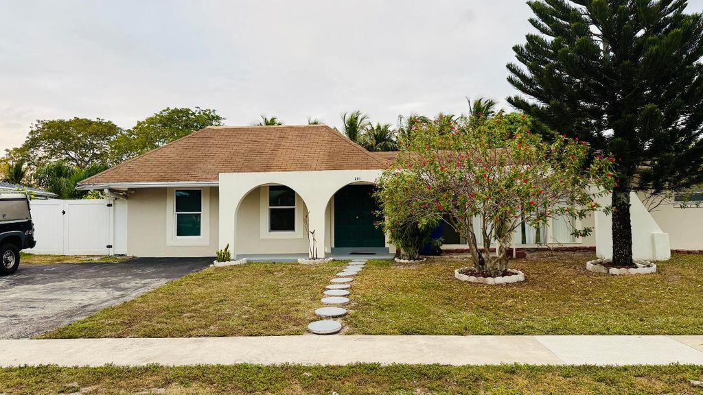 Photo of 931 Hibiscus Drive, Royal Palm Beach, FL 33411 (MLS # R11154591)