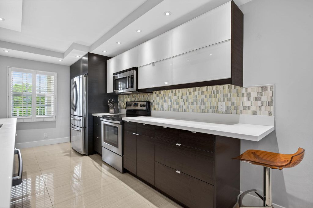 Photo of 3503 Oaks Way #506, Pompano Beach, FL 33069 (MLS # B26009974)