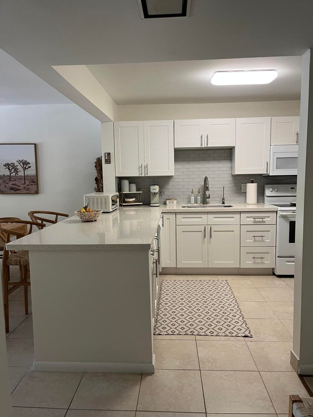 Photo of 2307 S Cypress Bend Drive #207a, Pompano Beach, FL 33069 (MLS # B26046611)