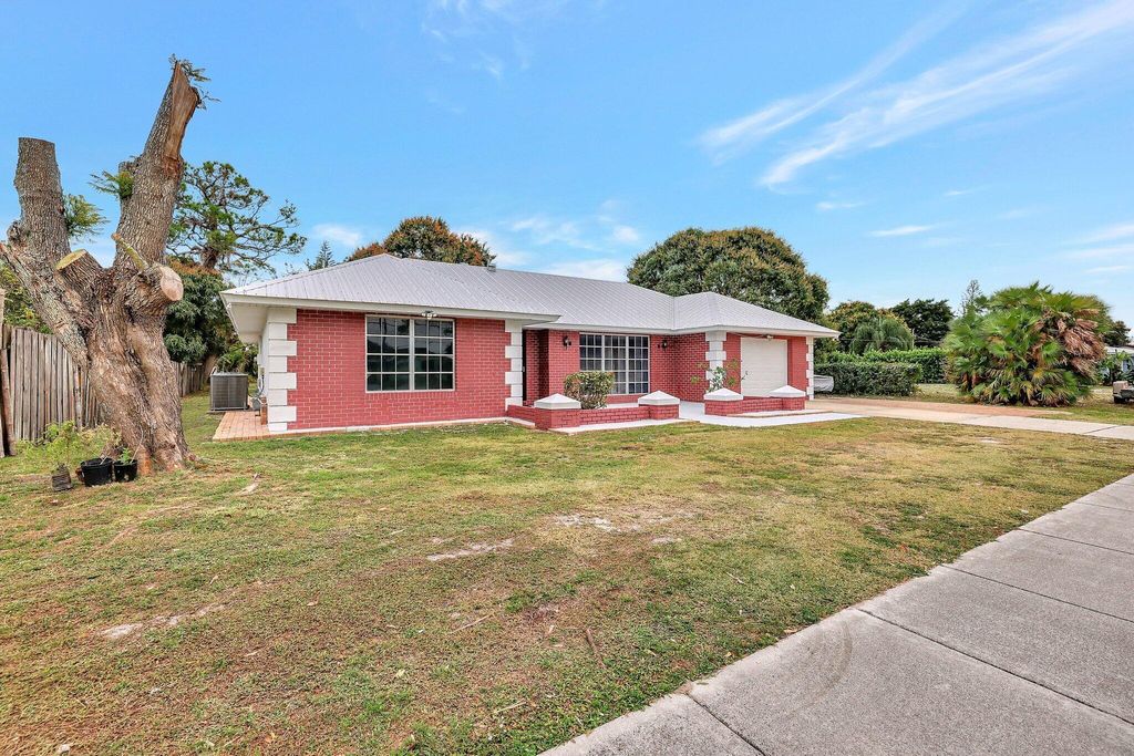 Photo of 388 E Prima Vista Boulevard, Port St Lucie, FL 34953 (MLS # R11112931)