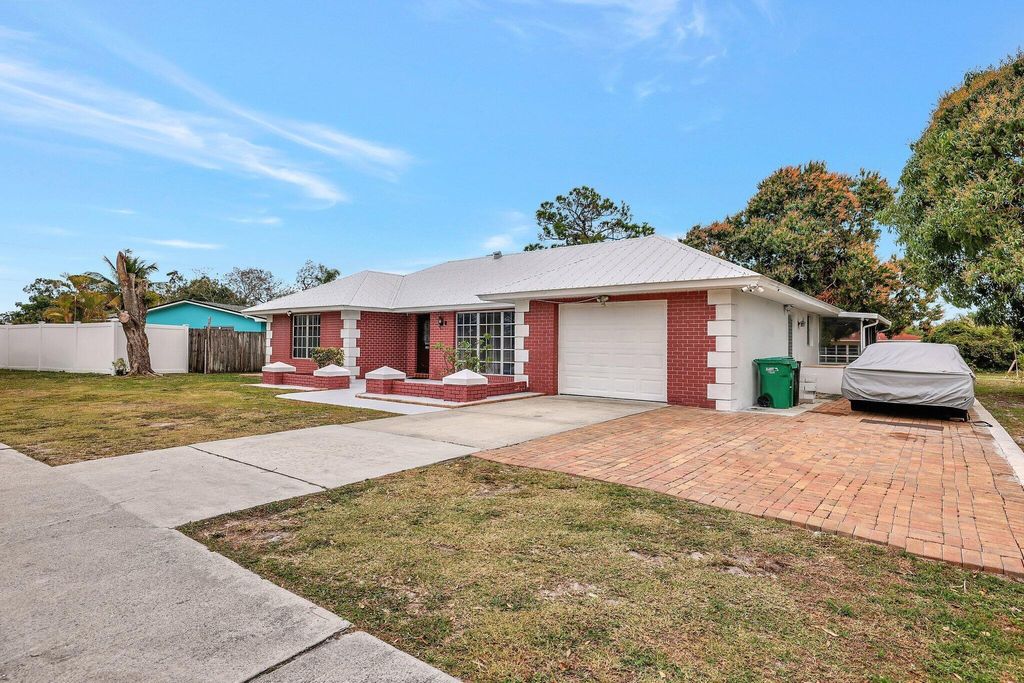 Photo of 388 E Prima Vista Boulevard, Port St Lucie, FL 34953 (MLS # R11112931)
