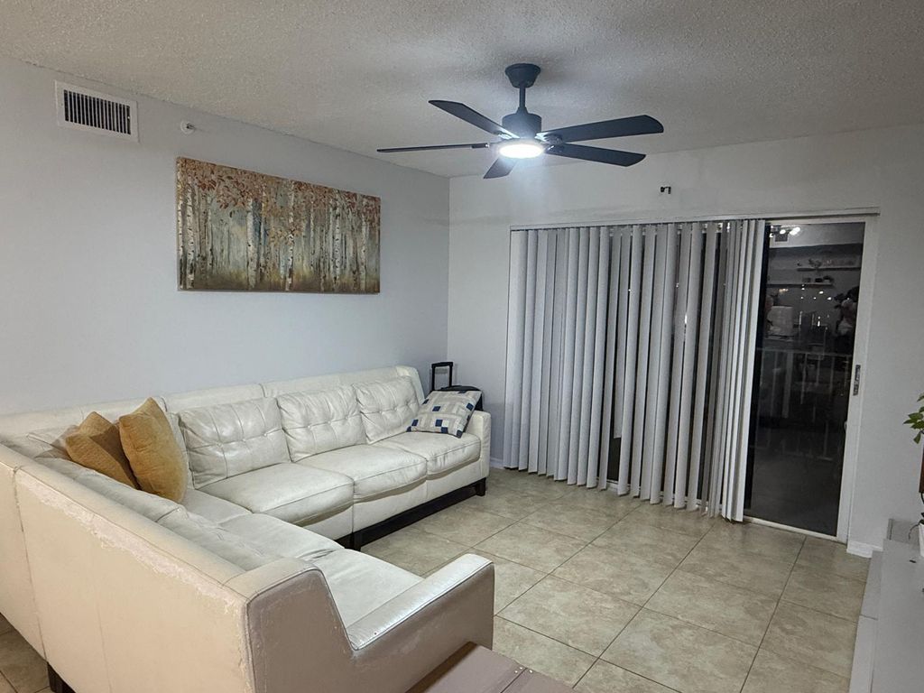 Photo of 3830 Lyons Road #108-3, Coconut Creek, FL 33073 (MLS # B26021614)