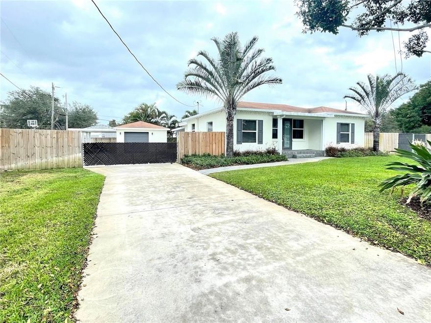 Beautiful, open concept CBS home on nearly 1/2-acre of land! Completely Remodeled Kitchen with Quartz Countertops and Stainless Steel Appliances. All Hurricane Impact Windows and Doors, Fully Fenced. Travertine Marble and Wood Floors throughout. Updated Electrical Panel, Tankless Water Heater, newer A/C. The patio and outdoor cooking/kitchen areas are an entertainment dream come true. Well-built metal insulated patio with outdoor lighting and ceiling fans. Plenty of room for pool...this property is not to be missed!