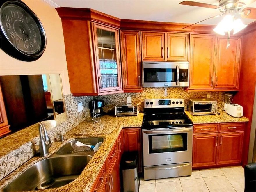 Top floor with convenient Elevator.This is a great Granite and Stainless Steel Kitchen .Gated over 55 one buyer can be 50.Community just West of Fort Lauderdale.Ceramic tile floors. Large screened balcony over looking gardens and heated pool area.Condo Assn requires Cash or a 20% down payment made by purchaser with contract, plus 6 months maintenance payment to be held in escrow for 18 months.