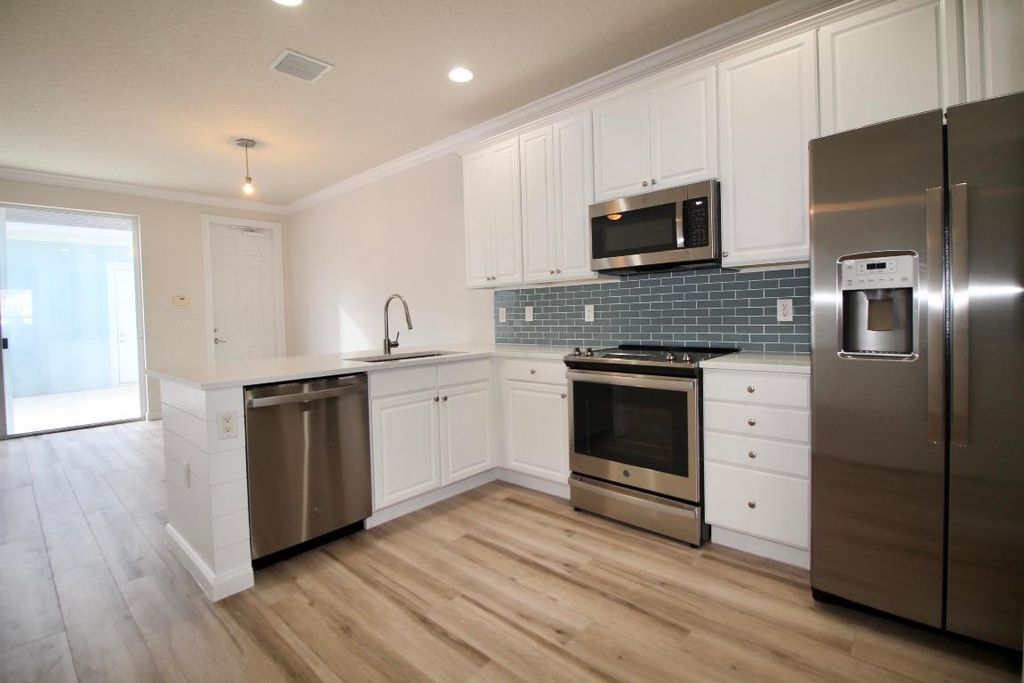 Photo of 1388 Ramsey Way, Jupiter, FL 33458 (MLS # R10954484)