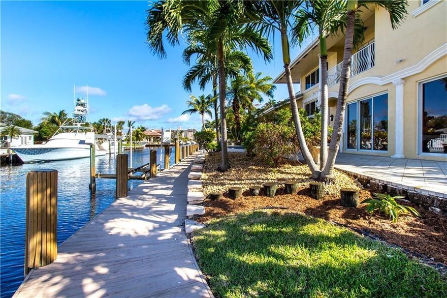 THE BEST VALUE IN LIGHTHOUSE POINT! PRIVATE CUL-DE-SAC LOCATION IN EXCLUSIVE LHP. BREATHTAKING LARGE POINT LOT! 4 BEDROOMS /4.5 BATHROOMS SINGLE FAMILY HOME ON 184' OF DEEPWATER, OVER 4,900 SQ FT & 3-MINUTES TO INTRACOASTAL BY BOAT.  FEATURES INCLUDE 1ST FLOOR MASTER SUITE WITH LOVELY WATER VIEWS, WINE ROOM WITH 800 BOTTLE WINE CELLAR, LARGE GRANITE KITCHEN W/DOUBLE WALL OVEN, WINE COOLER, SNACK BAR & OPENS TO SPACIOUS FAMILY ROOM, WATERFRONT LIVING ROOM AND DINING AREA WITH FIREPLACE IN LIVING ROOM, MARBLE FLOORING THROUGHOUT ENTIRE 1ST FLOOR, 16,000 LBS BOAT LIFT, LARGE PAVER PATIO WITH BEAUTIFUL COVERED LOGGIA, SUMMER KITCHEN AND HEATED POOL/SPA. THREE-CAR CLIMATE CONTROL GARAGE W/ TILE FLOORS. DOCK YOUR MEGA-YACHT HERE!