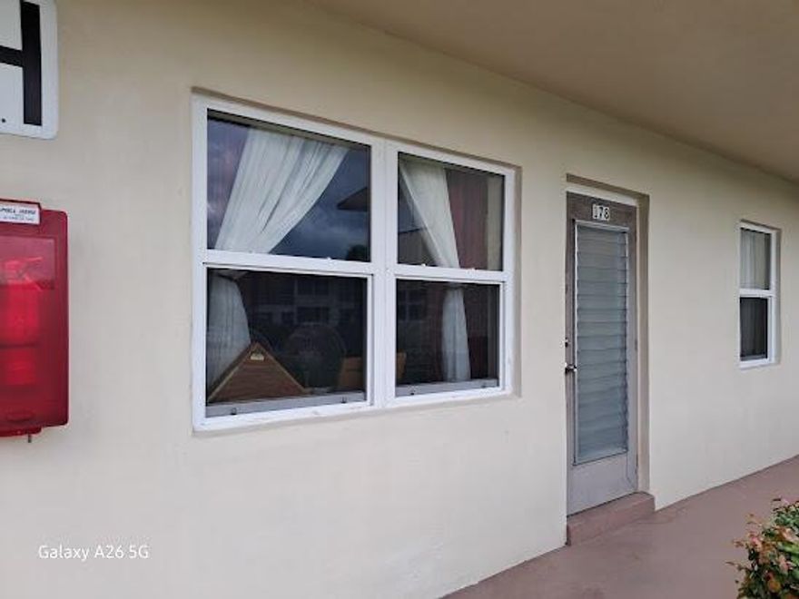 Ground floor unit with new impact windows and new air conditioner. Very Clean unit.