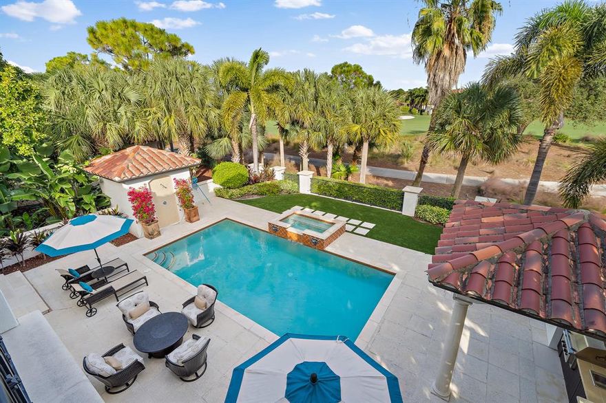 BEAUTIFULLY 2018 REDESIGNED TRANSITIONAL ESTATE in Eagle Tree Jupiter, a boutique community inside the gates of Trump National Jupiter. Nestled along the 8th fairway, this Estate home is move-in ready. From the newly installed wood flooring, light and bright woodwork and cabinetry and refreshing decor you will feel right at home. Offering a chef's kitchen with a quartz oversized island for all to gather and top of the line appliances. With an elegant master-suite on the first level, your family and guests will enjoy the privacy of their own suites and great room on the second level. The spacious, screened in covered patio, summer kitchen, pool and spa with a turf backyard offers plenty of outdoor entertainment area for the entire family.