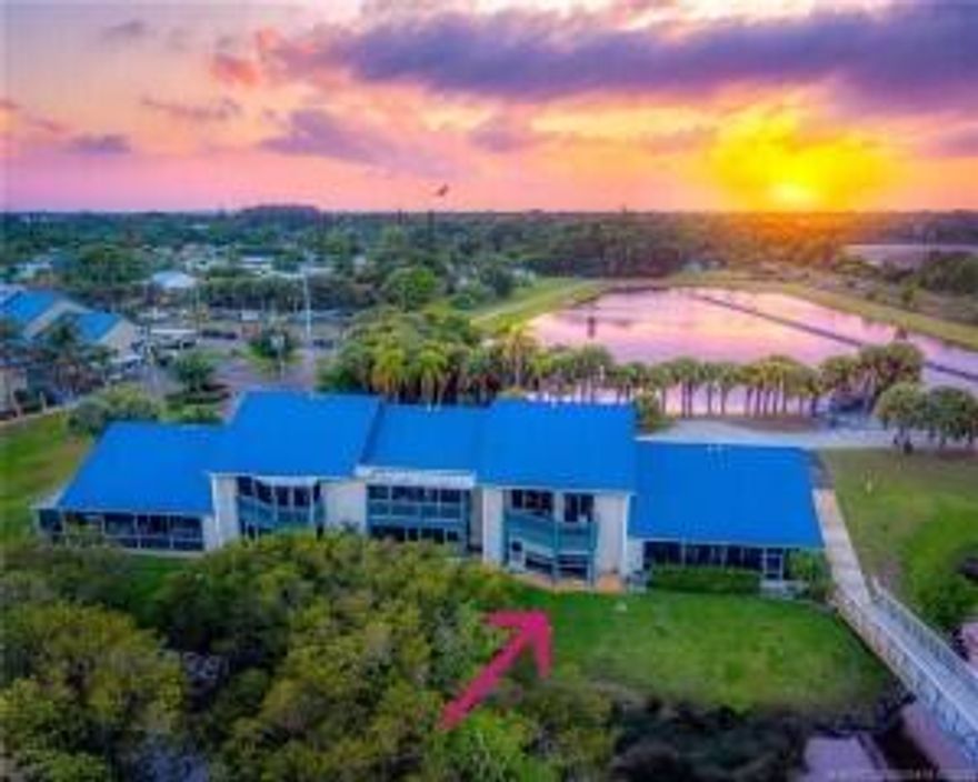 Welcome to this charming first-floor 2-bedroom, 1-bath condo in the desirable Beacon 21 community in Jensen Beach. Offering peaceful water views from both the front and the back, this unit presents a rare opportunity to enjoy a tranquil lifestyle with the convenience of being move-in ready. While the interior may benefit from some cosmetic updates, the home is completely turnkey—clean, functional, and ready for immediate occupancy. Enjoy morning coffee with serene water views, and take advantage of the community amenities including a marina, pool, tennis courts, and clubhouse. Perfect for full-time living or a seasonal retreat.