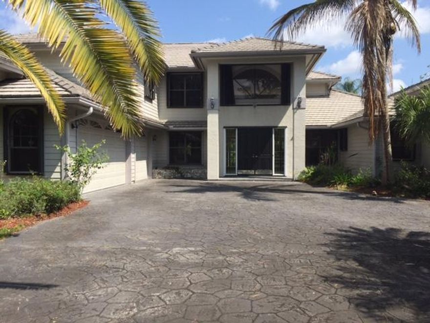 AMAZING ESTATE HOME ON 1.2 LUSH ACRES IN A VERY PRIVATE SETTING! THIS POOL HOME HAS LOTS OF GRANITE, NEW CEILING FANS INSIDE & OUT! WALLS ARE PREPPED & READY FOR YOU TO CHOOSE YOUR OWN CUSTOM PAINT! NEW AC UNITS! GORGEOUS WET BAR, STONE FIRE PLACE & SKYLIGHT IN FAMILY ROOM. BONUS POOL TABLE ON 2ND FLOOR LOFT PLUS MARBLE DINING ROOM TABLE STAYS TOO! OFFICE/DEN FEATURES BUILT IN SHELVES. MASTER BEDROOM SUITE WITH HIS & HER VANITY AREAS & SEPARATE TUB & SHOWER! IN GROUND POOL WITH OUTSIDE SHOWER & CABANA BATH! THIS IS TRULY AN OUTSTANDING PROPERTY! CALL TODAY FOR YOUR PERSONAL SHOWING!