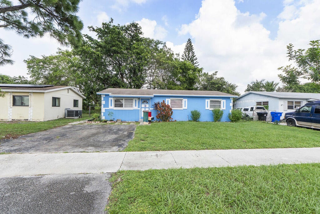 Photo of 7207 SW 4th Court, North Lauderdale, FL 33068 (MLS # B26087273)