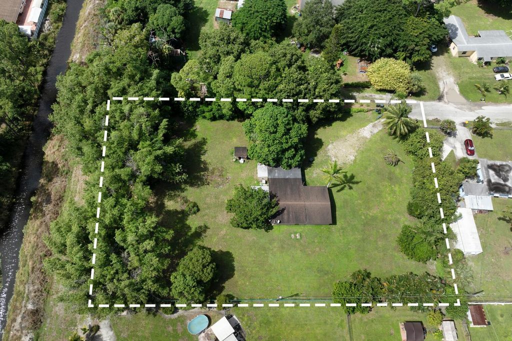 Photo of 2490 Sunset Drive, West Palm Beach, FL 33415 (MLS # R11130308)