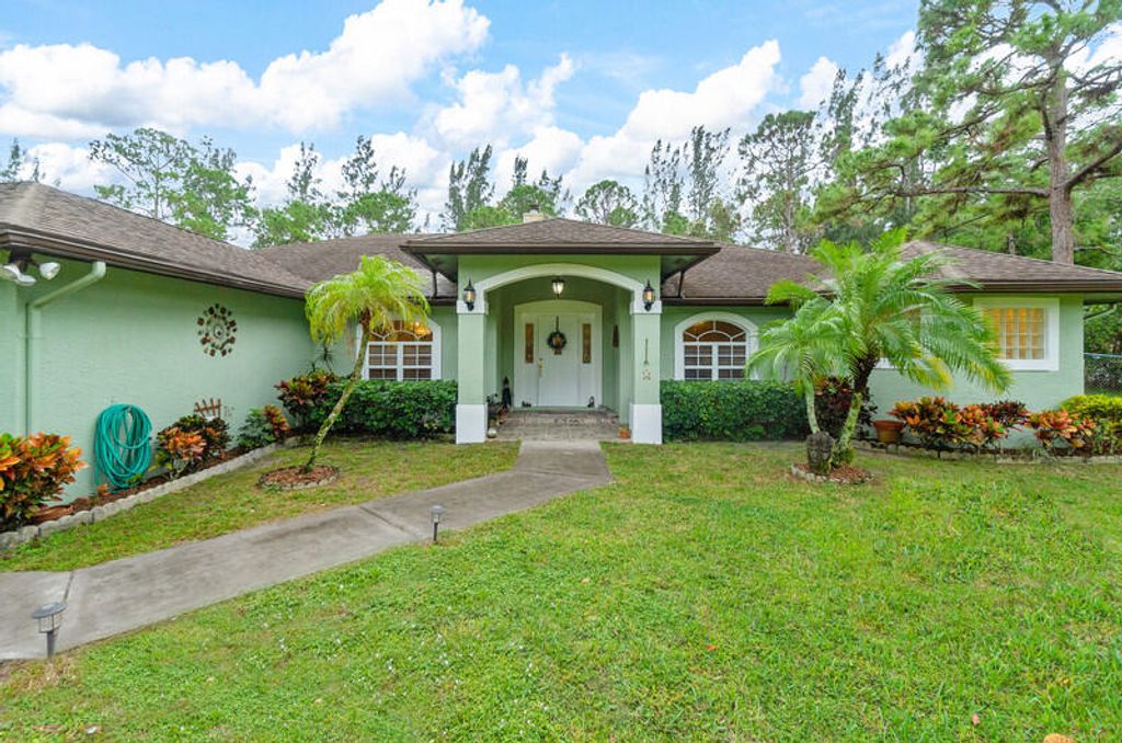 Photo of 12144 61st Street N, West Palm Beach, FL 33412 (MLS # R10937354)