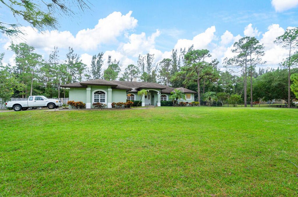 Photo of 12144 61st Street N, West Palm Beach, FL 33412 (MLS # R10937354)