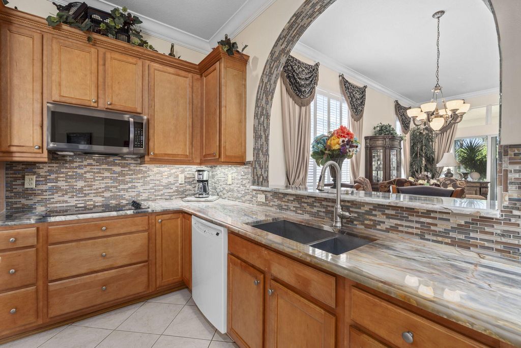 Photo of 9360 SW Nuova Way, Port Saint Lucie, FL 34986 (MLS # R11143958)