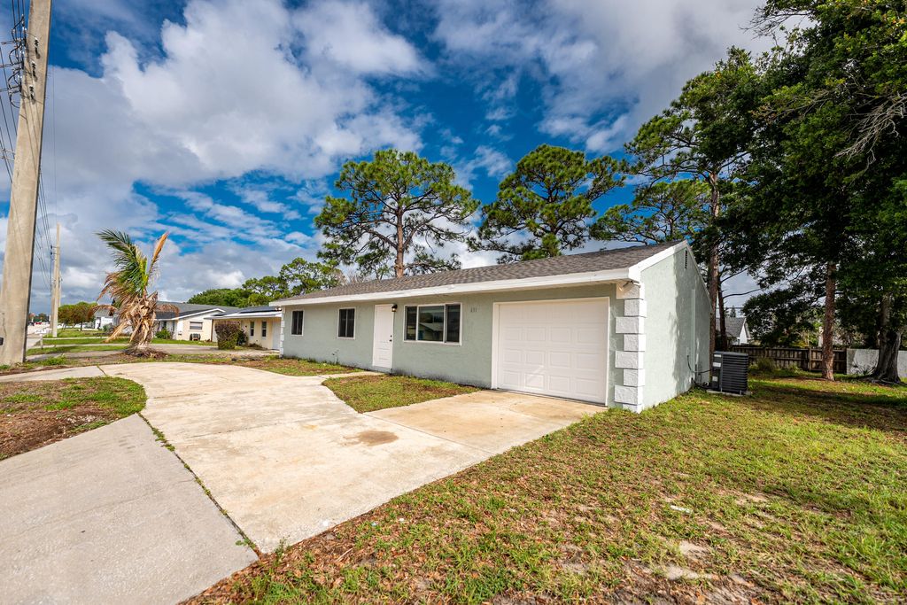 Photo of 651 SE Port St Lucie Boulevard, Port Saint Lucie, FL 34984 (MLS # B26013854)