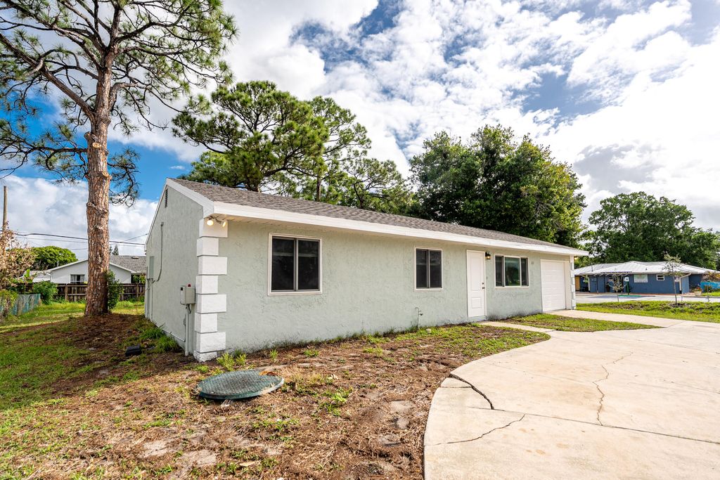Photo of 651 SE Port St Lucie Boulevard, Port Saint Lucie, FL 34984 (MLS # B26013854)