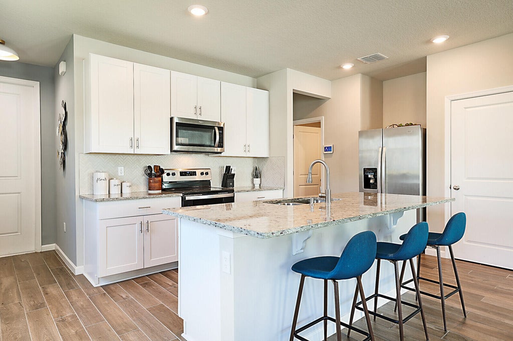Photo of 267 Osprey Preserve Boulevard, Jensen Beach, FL 34957 (MLS # B26056693)