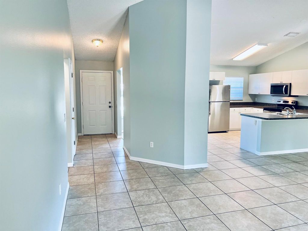 Photo of 5922 NW Culebra Avenue, Port Saint Lucie, FL 34986 (MLS # R11039641)