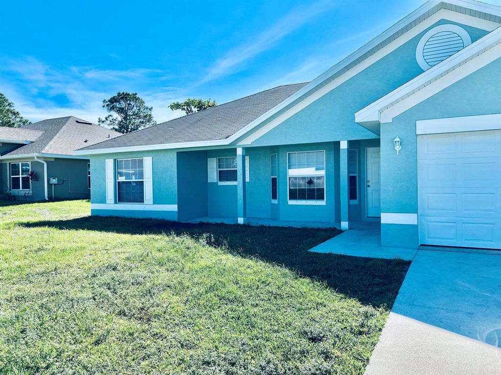 Photo of 5922 NW Culebra Avenue, Port Saint Lucie, FL 34986 (MLS # R11039641)