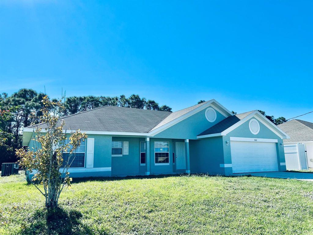 Photo of 5922 NW Culebra Avenue, Saint Lucie West, FL 34986 (MLS # R11039641)