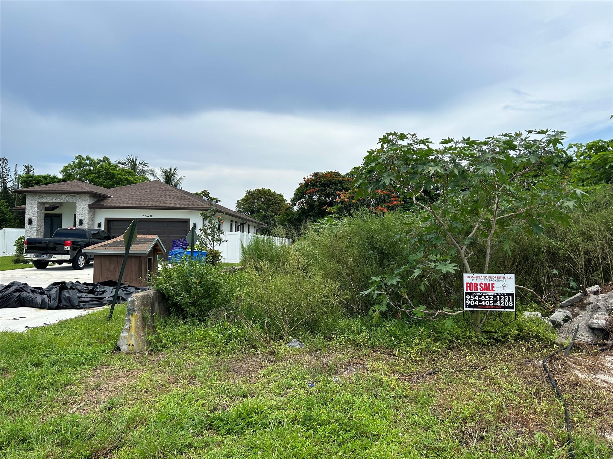 LEADING YOU HOME to an opportunity to customize your oasis-lot appraised at $150k- Desirable oversized lot. This lot already has water & electricity points for connection. Survey Included. Build your dream home on rarely available 9,008 square feet of land that is situated in a growing neighborhood. Lot WAS previously cleared in 2021 but has regrown mature trees. The 3/2 pool home next door appraised for $450,000 in 2021. Two blocks away new construction sold for $475k in 2023.. Road infrastructure to be planned with your blueprint. Experienced builders will appreciate this. Close to shopping centers and I-95. This is one of the few lots located on the NW side of 20th Ave, near Oswald community park & recreation facility.