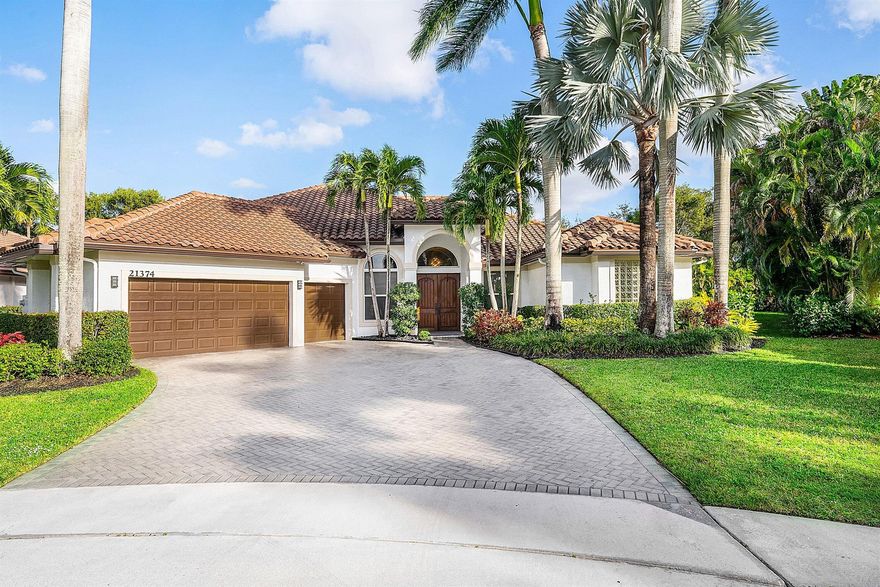 Welcome to The Estates in Boca Falls. This one-story estate sits in the cul-de-sac on a rare 0.36-acre lot, offering 5,013 total square feet, with 3,815 square feet under air. Enjoy a modern chef's kitchen, with a wine refrigerator, three  A/C systems, and a resort-style saltwater pool and spa. The expansive patio features a built-in wet bar, perfect for entertaining. Inside, find seven versatile rooms and five bathrooms, enhanced by elegant finishes. Additional features include updated landscaping, security cameras, and an electric vehicle charger. Located in a top-rated school district and near South County Park, this home blends luxury, comfort, and convenience.