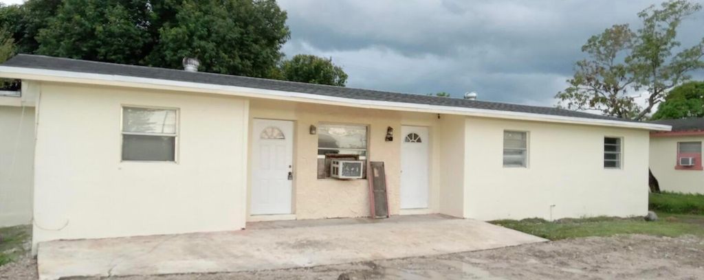 Photo of 228 NW 9th Avenue #A, South Bay, FL 33493 (MLS # R10982701)
