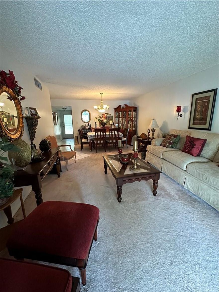 Welcome to your new home in a gated community!! Spacious 2 bedroom, 2 bath on the 1st floor. Newer air conditioner. Screened in porch. Priced to sell! This won't last long!!