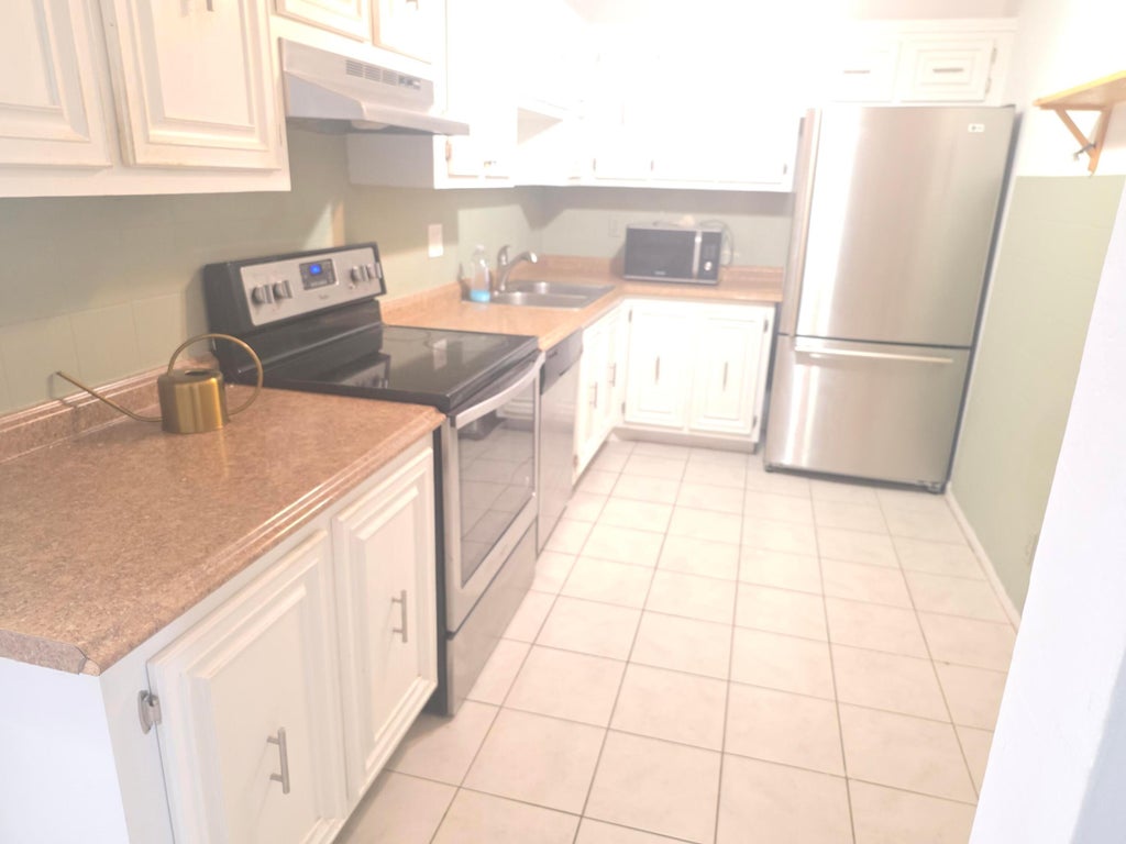 Photo of 959 SE 2ND Avenue #226, Deerfield Beach, FL 33441 (MLS # B26063633)