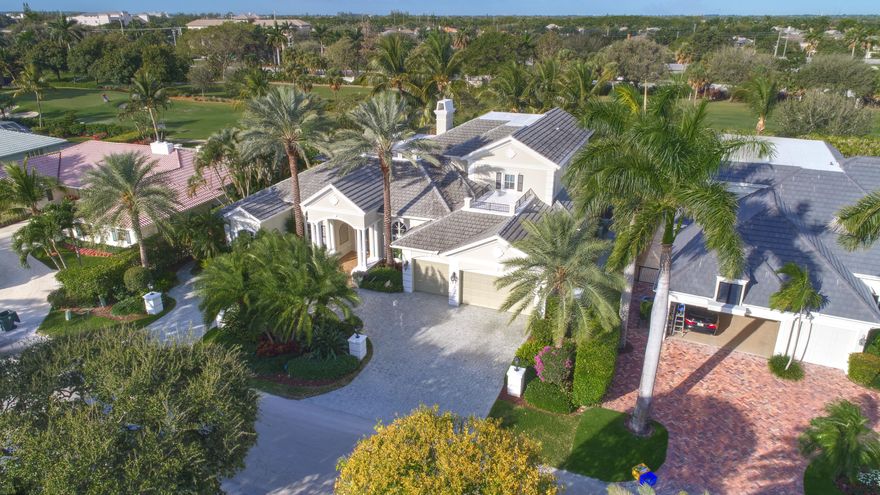 Exceptional value on the 12th fairway of the prestigious Royal Palm Yacht & Country Club golf course. This 5BR/5.5BA home has been maintained impeccably and features all of the ''must have'' features: natural light, soaring vaulted ceilings, private first floor Master suite with his and her baths, office, and first floor guest suite. Marble and Brazilian cherry wood flooring. All impact glass. Summer kitchen and outdoor living area is spacious and designed to maximize the Florida experience. Heated pool and spa with waterfall, marble pavers, and drape-flanked covered loggia. All upstairs bedrooms feature en-suite baths and ample closets. Upstairs junior Master features an over-sized terrace with 12th hole golf course views. Natural-gas generator, 4-zone A/C, 3-car garage. Built in 2002.
