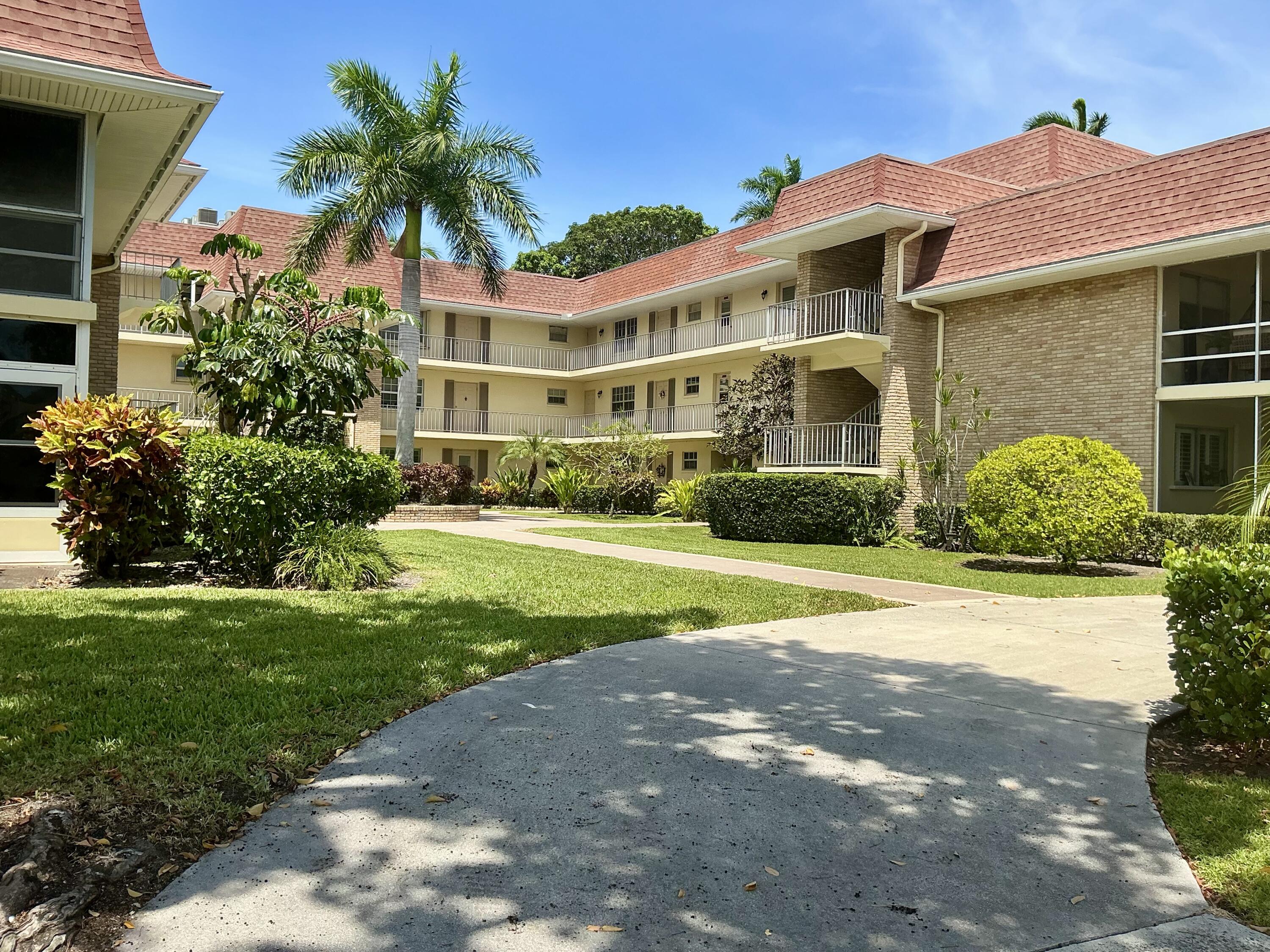 Welcome to this spacious and light-filled 2-bedroom, 2-bath condo in the heart of Palm Beach Gardens. Located in a desirable 55+ community, this unit features a split-bedroom floor plan, renovated kitchen, and updated bathrooms. Vinyl plank flooring will be installed prior to move-in, complementing the neutral color palette throughout. Enjoy an open living and dining area with abundant natural light, ample closet space, and the convenience of covered assigned parking. Centrally located with easy access to I-95 and the Turnpike, and just minutes from premier shopping, dining, and entertainment.