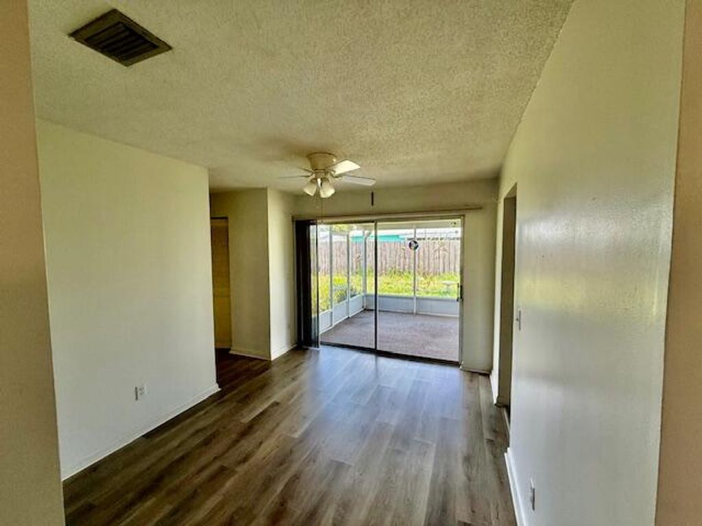 Photo of 717 SE Alamanda CIR, Stuart, FL 34996 (MLS # B26031126)